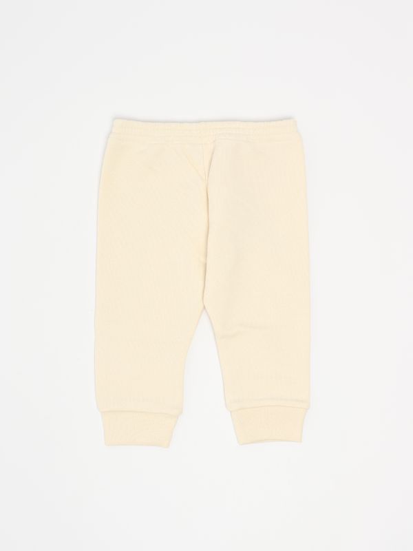 2. Jogger para recién nacido de Gucci de algodón con logo Web Beige Claro Gucci 631657xjgpc