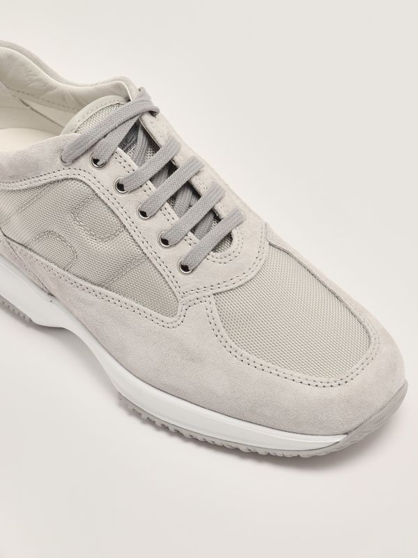 Interactive men's sneakers in leather and textured fabric