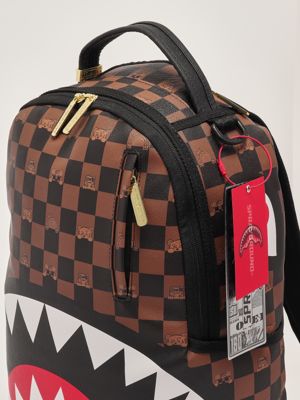 4. Peeking Character Check faux leather backpack for boys Black-Brown Check