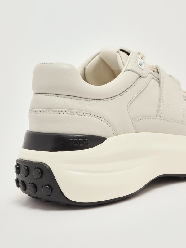 Tod's 81L leather sneakers for women - Milk | Caposerio.com