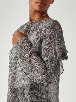 5. Blusa de seda para mujer Negro