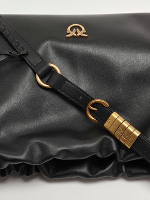 6. Bolso clutch de piel para mujer Negro