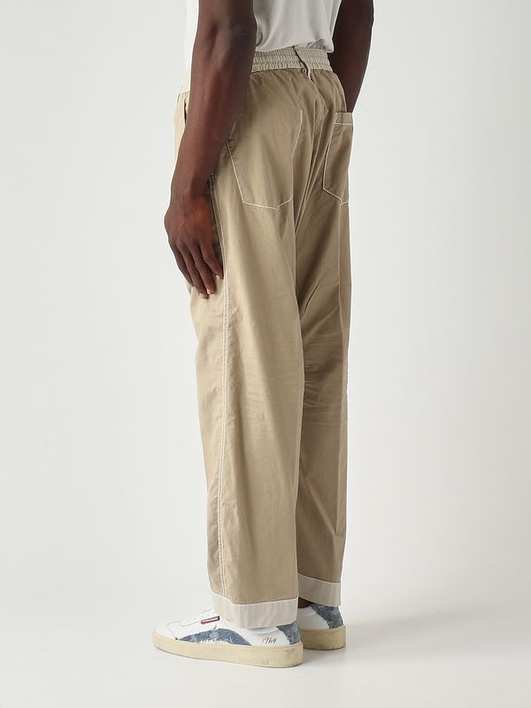 4. Pantalón de hombre Inside Out en sarga de algodón elástico Crema Dsquared2 s74kb1101s35175