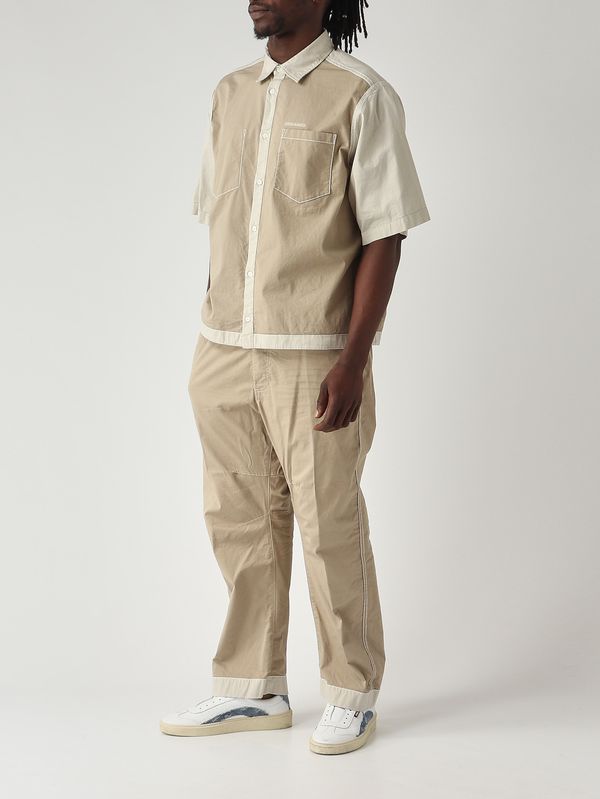 2. Pantalón de hombre Inside Out en sarga de algodón elástico Crema Dsquared2 s74kb1101s35175