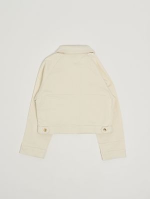 2. Chaqueta de niña de algodón elástico. Crema