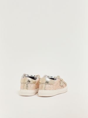 3. Zapatillas de piel para recién nacido Purpurina dorada