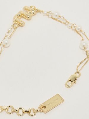 3. Women's Balloon bracelet with beads Gold