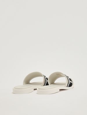 3. Mädchen-Sandalen aus Leder Schwarz-Weiß