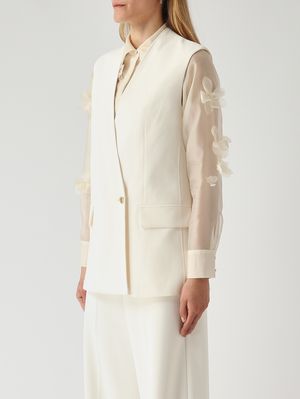 3. Chaleco de mujer Budoni en cady elástico. Marfil