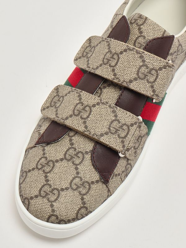 5. Zapatillas deportivas para niño en tejido GG Supreme y piel. Beige Gucci 463091facyf