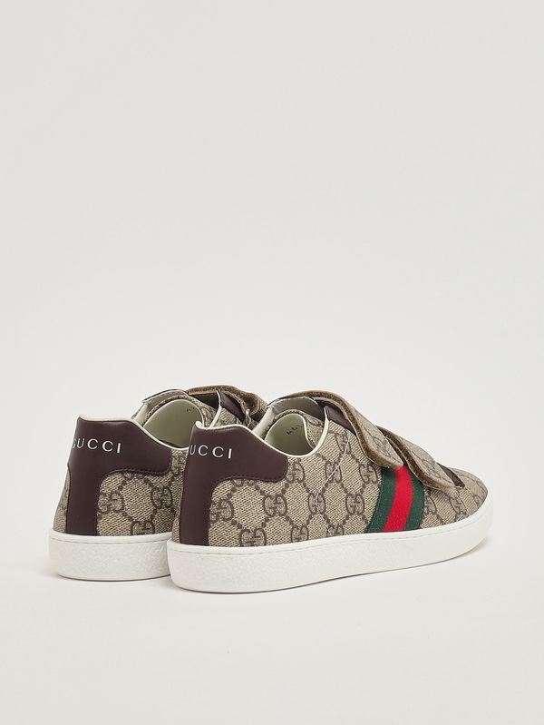 3. Zapatillas deportivas para niño en tejido GG Supreme y piel. Beige Gucci 463091facyf