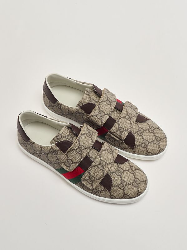 2. Zapatillas deportivas para niño en tejido GG Supreme y piel. Beige Gucci 463091facyf