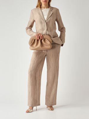 2. Pantalón de mujer en tejido lurex. Arena