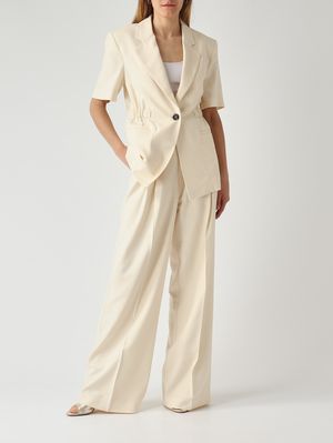 2. Blazer de mujer Assago en tejido frisotté de mezcla de viscosa elástica. Mantequilla