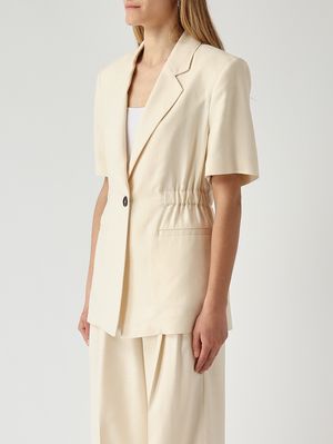 3. Blazer de mujer Assago en tejido frisotté de mezcla de viscosa elástica. Mantequilla