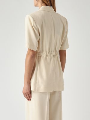 4. Blazer de mujer Assago en tejido frisotté de mezcla de viscosa elástica. Mantequilla