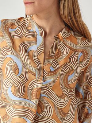 5. Women's silk shirt Leather